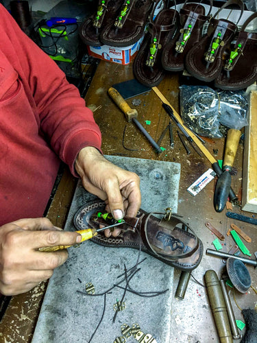 Man Making Sandals